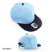 A sky blue and navy cap featuring a logo on the front and a snapback closure at the rear.