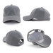A grey mesh cap with a structured design, featuring a logo and an adjustable strap at the back.