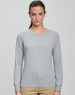 A long-sleeve tee shirt in light grey, featuring a round neckline and a fitted design. It has a logo on the chest.
