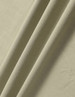 A close-up of soft, folded fabric in a muted green shade. The material has a smooth texture.
