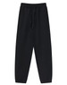 Black unisex sweatpants with an elastic waistband and side pockets, featuring a logo.
