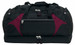 A large black duffle bag with maroon accents and multiple zippered compartments. It features handles and a logo.