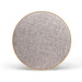 A round Bluetooth speaker in a light grey fabric finish with a wooden border. It features a logo.