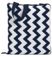 A patterned outdoor blanket featuring a navy blue and white zigzag design, with carry handles and a zip closure.