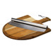 A wooden pizza peel with a stainless steel cutting blade, featuring a leather hanging strap.
