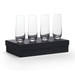 Four clear glass stemless champagne flutes arranged on a black gift box.