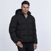 A black puffer jacket with a hood, zip closure, and side pockets, worn by a person standing against a plain background.