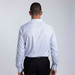 A men's button-up shirt in light blue check pattern, with a collar and long sleeves, featuring a logo.