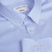 A blue and white checkered button-up shirt with a collar and branded tag. Features pearl-like buttons.