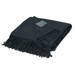 A black Merino blanket featuring fringed edges and a small logo patch.