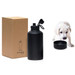 A drink bottle in matte black with a cap, placed beside a cardboard box and a puppy drinking from a bowl.