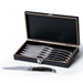 A knife set featuring six stainless steel knives with black handles, presented in a stylish black wooden box.