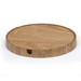 A round wooden placemat in a light timber finish, featuring a smooth surface and a groove design around the edge.