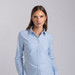 A light blue button-up shirt with a classic collar and long sleeves, featuring a logo.