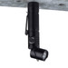 A black FlexLight Torch with an adjustable head and a clip for attachment, designed for portable lighting.