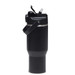 A drink bottle in matte black with a handle, featuring a spout and a secure lid. It has a branding logo.