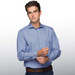 A blue, button-up shirt with a checked pattern and a logo on the chest, featuring long sleeves and a classic collar.