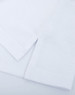 A white cotton towel displaying a textured surface and neat edges, featuring a simple design without embellishments.