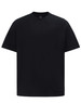 A black unisex heavy cotton oversized tee with a simple design and a logo on the front.