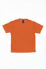 An orange t-shirt with a simple design and a label on the inside neck.