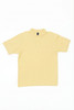 A yellow polo shirt featuring a collar and a logo. Simple design with short sleeves.