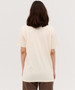 A plain cream Classic Tee in a relaxed fit, featuring a logo on the back.