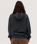 A grey hoodie with a large hood, featuring a relaxed fit and long sleeves, seen from the back.