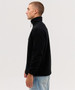 A black polar fleece 1/4 zip jacket displayed on a model from the side, featuring a zip collar and a branding logo.