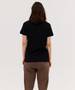 A black women's polo shirt displayed from the back, featuring short sleeves and a fitted design.