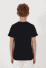 A black youth essential tee displayed on a child from the back, featuring a simple design and a logo.
