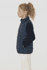 A navy blue youth puffer vest with a high collar, featuring side pockets and a fitted design.