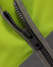 A close-up of a zip on a high visibility safety vest in bright yellow and grey. The vest features utility pockets.