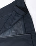 A waterproof jacket in navy, featuring zippered pockets and mesh lining. It includes a logo.