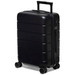A black hardcase trolley with multiple wheels, featuring a sturdy handle and a sleek surface design.