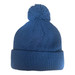 A blue 6 seam knitted beanie with a pom pom on top, featuring a fold-over cuff. It has a logo on one side.