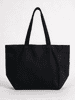 A black canvas tote bag featuring two shoulder straps and a side pocket, with a simple design and a logo.