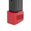 Red Henning magazine extension installed on a Smith & Wesson M&P magazine