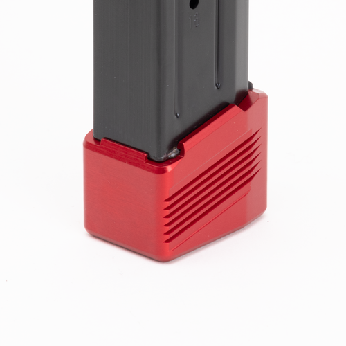 Underside of the Henning M&P magazine extension showing the retaining base and set screw