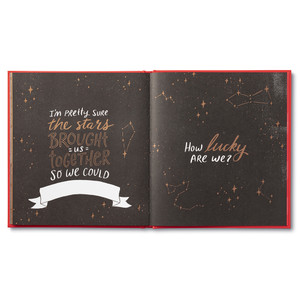 This page has a black background with constellations of golden stars. The copy reads, "I'm pretty sure the stars brought us together so we could __________. How lucky are we?"