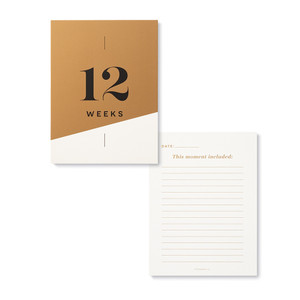 This card has "12 Weeks" written across the front, with a black and white background, and the back of the card left blank to be written on. 