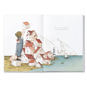 Inside spread from "Maybe" a children's illustrated book  by Kobi Yamada and Gabriella Barouch that shows a child, with her pig friend, placing a house atop a series of houses along a coastal shoreline. The copy on the page reads, "Maybe you will build things that reach high into the sky?"