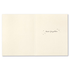 The inside of this card features a white background and copy that reads "Never forgotten."