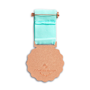 Back side of medal, an award medal with a teal blue ribbon and an illustration that reads “Dog Person”, includes keepsake gift box, black slip cover with medal image in cover, medal sits securely in tray box and has an attachment safety pin.