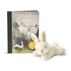 Photo featuring the childrens illustrated book, You Belong Here, written by M.H. Clark and illustrated by Isabelle Arsenault, and the companion cuddly, adorable bunny stuffy plush.