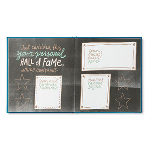 This page has a gray background with prompts and white blocks of space to write. The copy on the page reads "Just consider this your personal hall of fame, which contains: Your most remarkable achievement [fill in the blank]. Your wisest piece of advice [fill in the blank]. Your most famous saying [fill in the blank]."