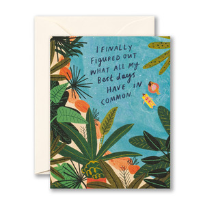 This image shows a friendship card with envelope. The card front features an illustration of a tropical setting with two friends floating on water, and the statement "I finally figured out what all my best days have in common."