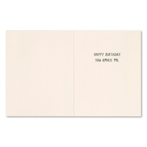 The inside of this card features a white background and copy that reads "Happy birthday. You amaze me."