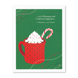 The front of this holiday card features an illustration by Jessica Phoenix and has a green background with a red mug filled with hot chocolate that is topped with whipping cream and a candy cane, and the quote “…it is Christmas and I wish you happiness…” —Henry van Dyke