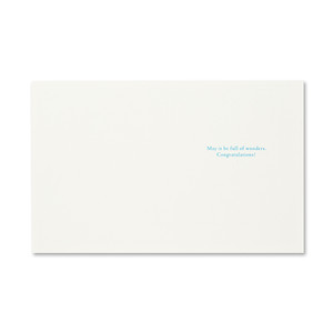 The inside of the card features a white background and copy that reads "May it be full of wonders. Congratulations!"