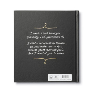 A back cover of "I Wrote a Book About You", a fill-in-the-blank gift book written by M.H. Clark. The copy on the back read, "I wrote a book about you. (No really. I did. You're holding it.) I filled it out with all my thoughts on what makes you so you. Because you're wonderful. And I want you to know."